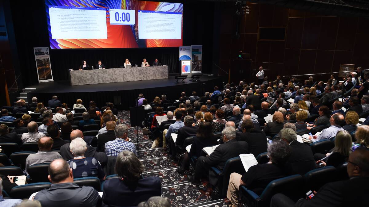 Packed in: Hundreds of delegates from councils ranging from Tweed Heads to the Bega Valley filled the Albury Entertainment Centre's stalls and gallery on Monday. Picture: MARK JESSER