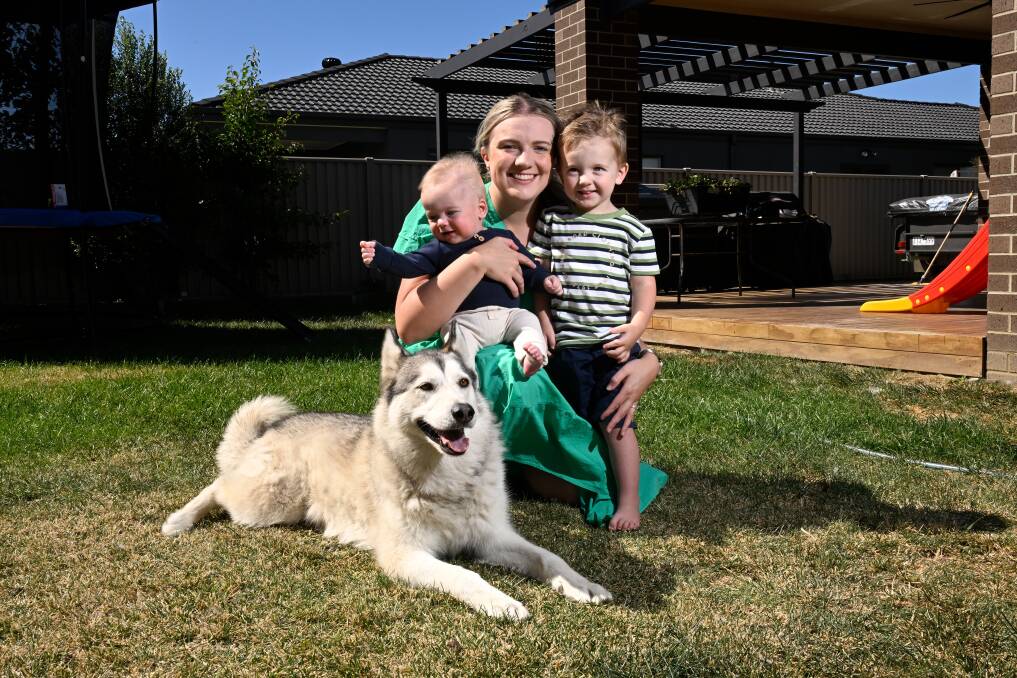 Caitlin Walker with dog Nala and kids Aston and Oakley. Picture by Adam Trafford Caitlin Walker with dog Nala and kids Aston and Oakley. Picture by Adam Trafford