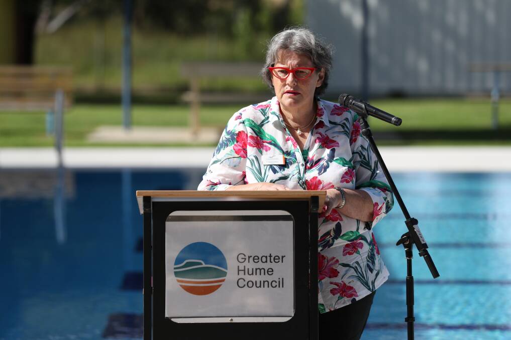 CALL-OUT: Greater Hume Mayor Heather Wilton at the Holbrook Swimming Pool opening. Holbrook and Henty's new pools contributed to a budget overspend.