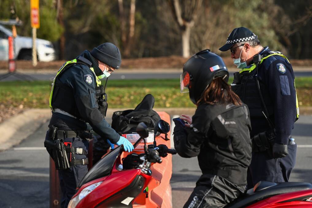 COMPLIANCE: Victoria Police checking drivers on the Lincoln Causeway on Monday. Their operation continues to move around the region. MP Jaclyn Symes wants a NSW 'ring of steel'. Picture: MARK JESSER