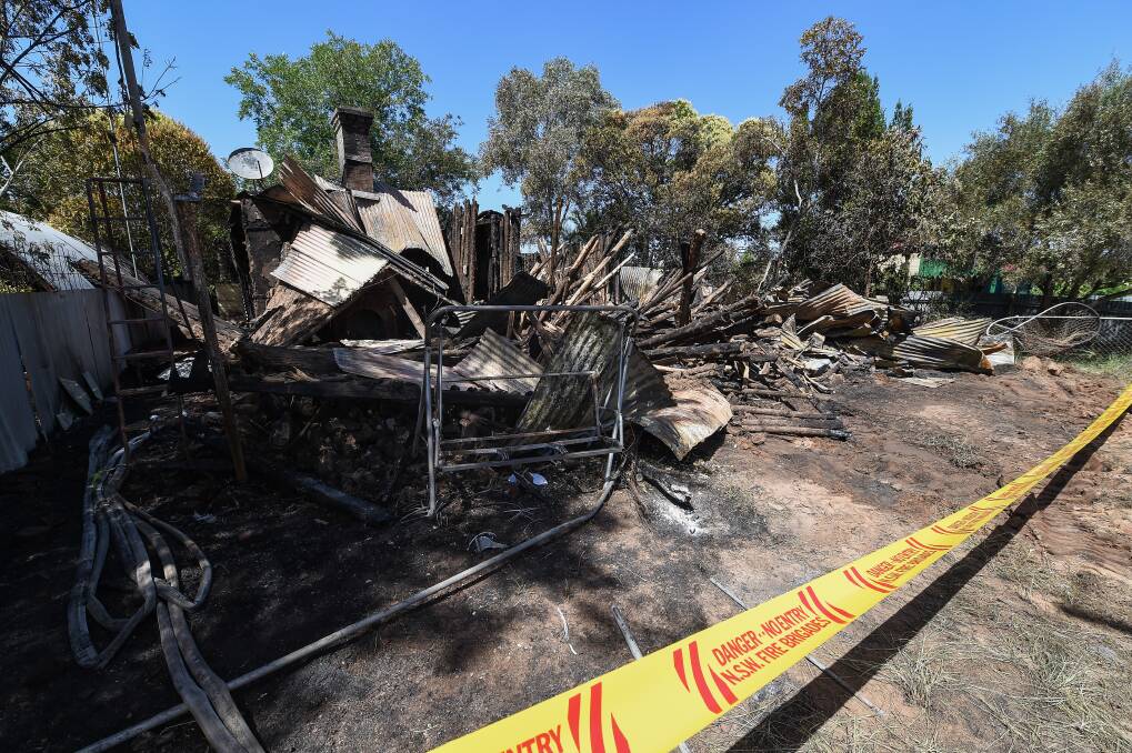 GUTTED: A Henty home, that has not been lived in for 12 months, was destroyed by fire early on New Year's Eve. Picture: MARK JESSER