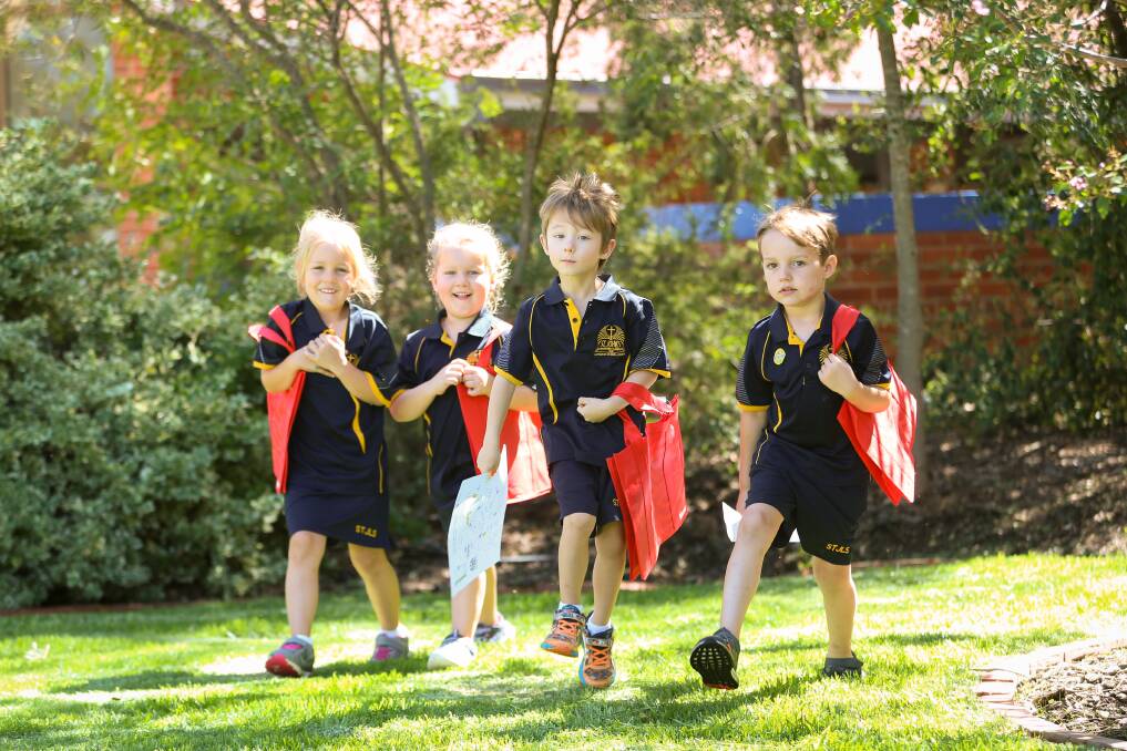 NO GO: St John's Lutheran Jindera School students Lily Ross, 5, Grace Allan, 5, Alex Chambers, 5, Raymond Lynch, 6, didn't get to use their treasure hunt maps on Friday after the fair was cancelled. Picture: JAMES WILTSHIRE