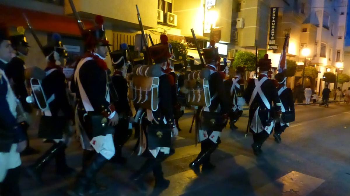 Soldiers march through the streets firing off old muskets. Photo: Nicole Phillips Soldiers march through the streets firing off old muskets. Photo: Nicole Phillips