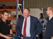 Deputy Prime Minister Barnaby Joyce, campaigning in Singleton, says regional newspaper are essential, "otherwise I can get away with anything". Picture: Max Mason-Hubers