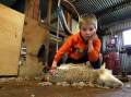 Charlie Dunn, 5, right at home in the shed. Picture: Les Smith