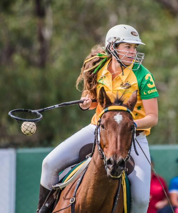 NOTABLE: Lucy Grills, pictured in action in this year's Polocrosse World Cup in Queensland, was last week named winner of the Women in Sport Local Champion award at the Australian Sport Women's Health Awards.