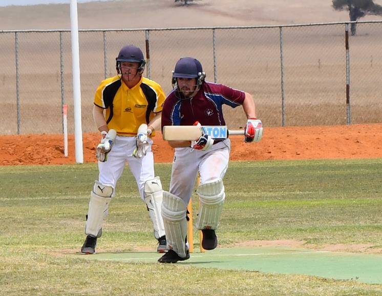 ACTION: Culcairn's Norm Barlow makes off for a run as Osborne's Sam McCready watches on. Culcairn is now all but assured a finals berth. Picture: Lorri Roden 