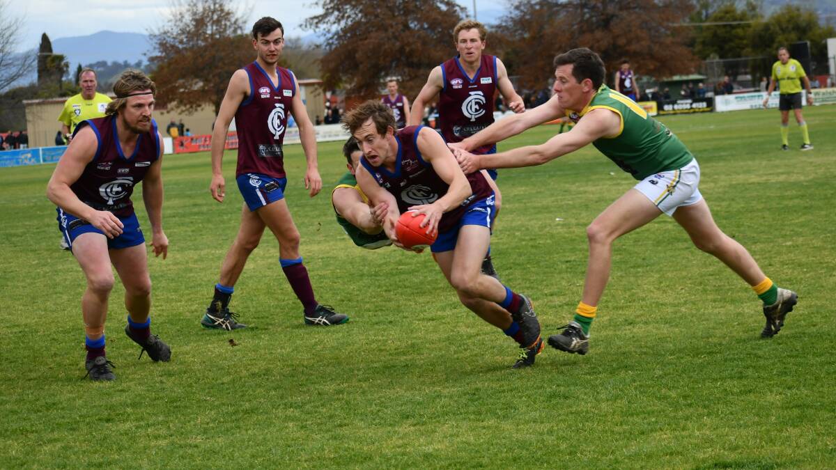 REVENGE: Culcairn's Tim Hallinan looks to move the ball during his side's hard-fought victory over Holbrook. Picture: LORRI RODEN