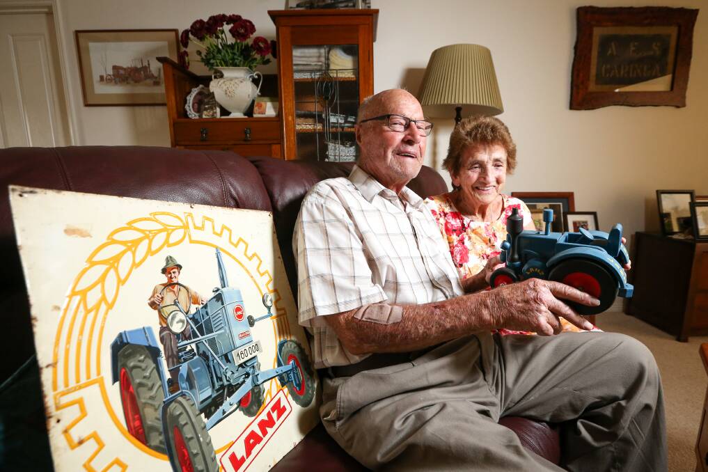 COLLECTION: Len Schilg, pictured with his wife of nearly 64 years Joan, admits he is sad to be selling off his collection of tractors and farm machinery. Pictures: JAMES WILTSHIRE