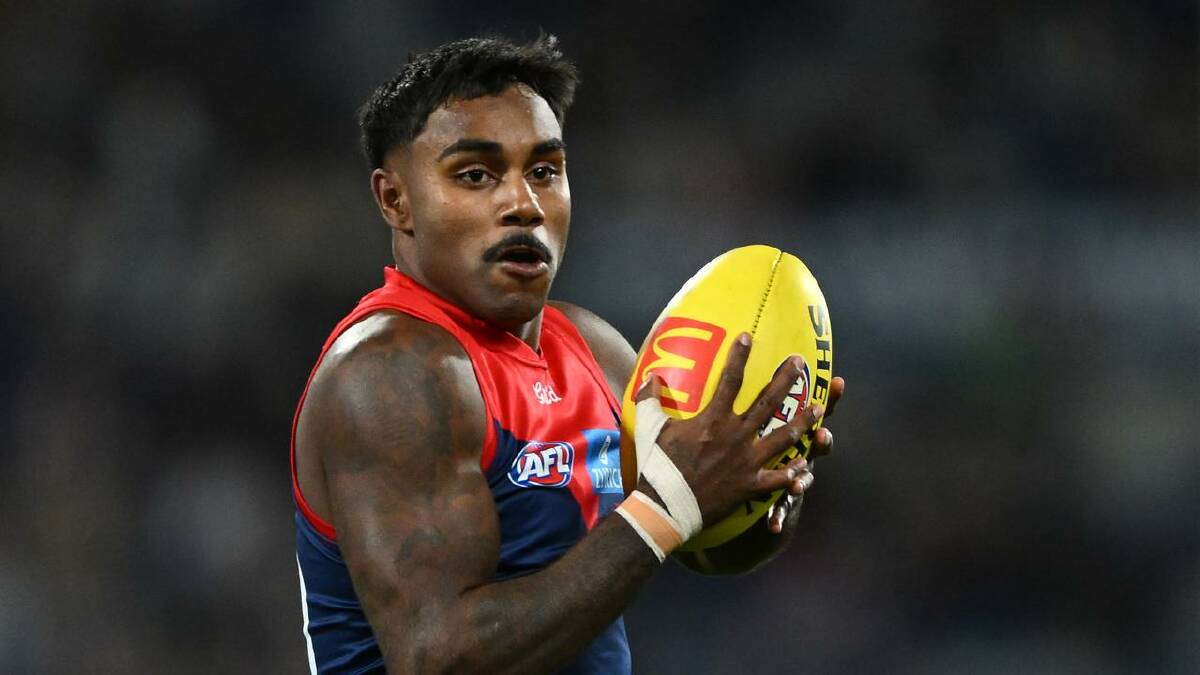 Kysaiah Pickett rolled his ankle in the Demons' defeat against Essendon. (James Ross/AAP PHOTOS) Kysaiah Pickett rolled his ankle in the Demons' defeat against Essendon. (James Ross/AAP PHOTOS)