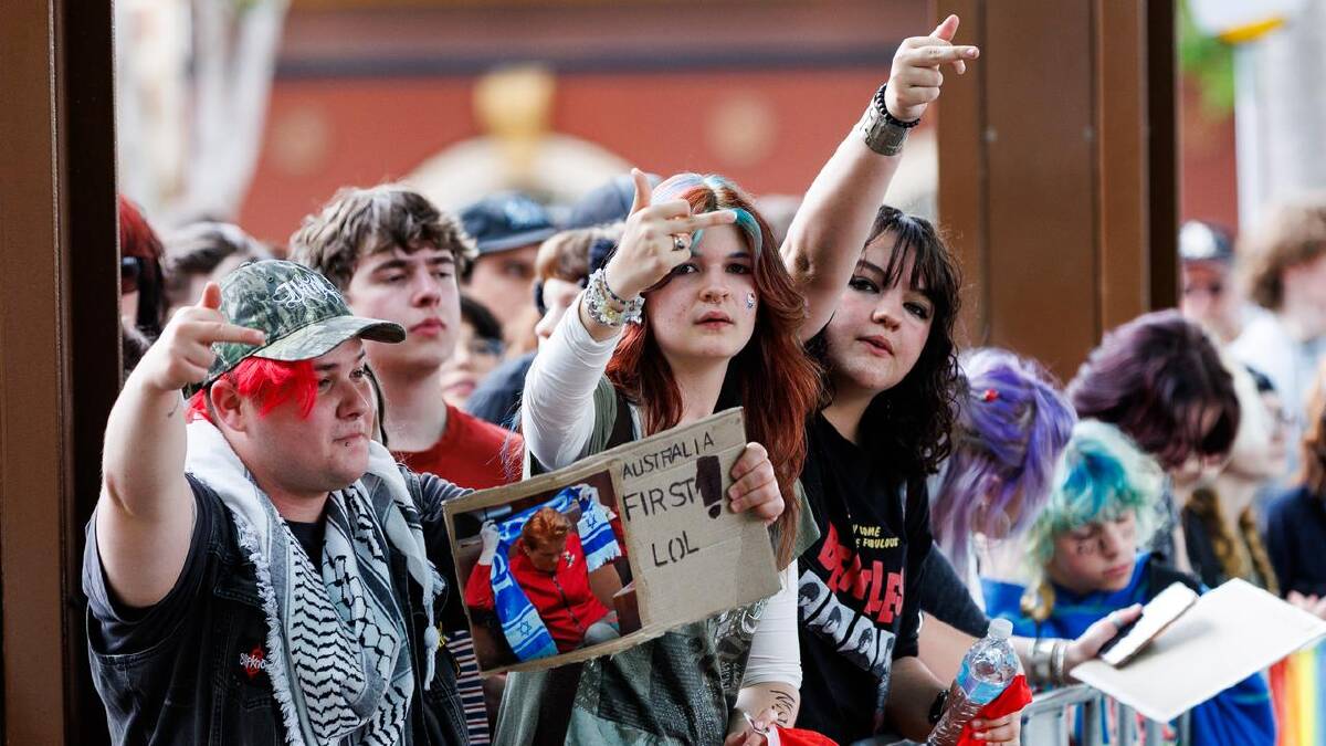 Rainbow protesters gathered outside the conservative conference in Brisbane. (Russell Freeman/AAP PHOTOS)