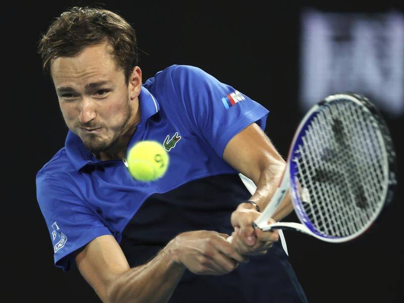 Daniil Medvedev is through to the second round of the Australian Open by beating Frances Tiafoe.