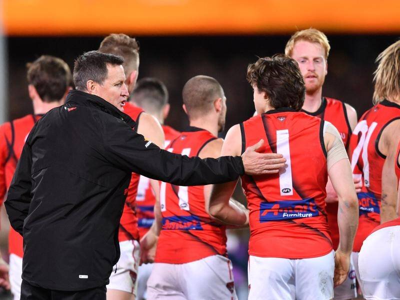 Coach John Worsfold (l) hailed his Bombers' improvement after their latest AFL win over the Crows.