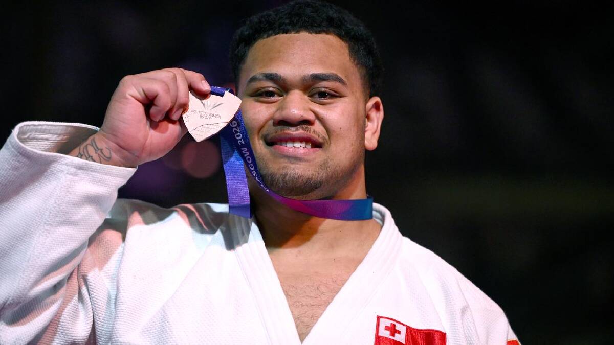 Judoka Paula Monta proudly shows off his bronze medal. (Joel Carrett/AAP PHOTOS) Judoka Paula Monta proudly shows off his bronze medal. (Joel Carrett/AAP PHOTOS)