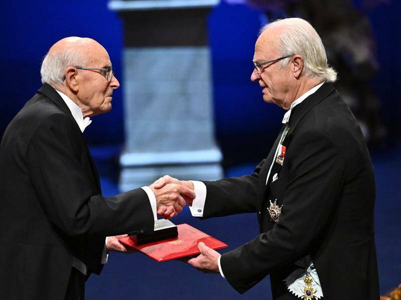 Australian chemist Richard Robson receives his prize from Sweden's King Carl Gustaf. Photo: EPA PHOTO Australian chemist Richard Robson receives his prize from Sweden's King Carl Gustaf. Photo: EPA PHOTO