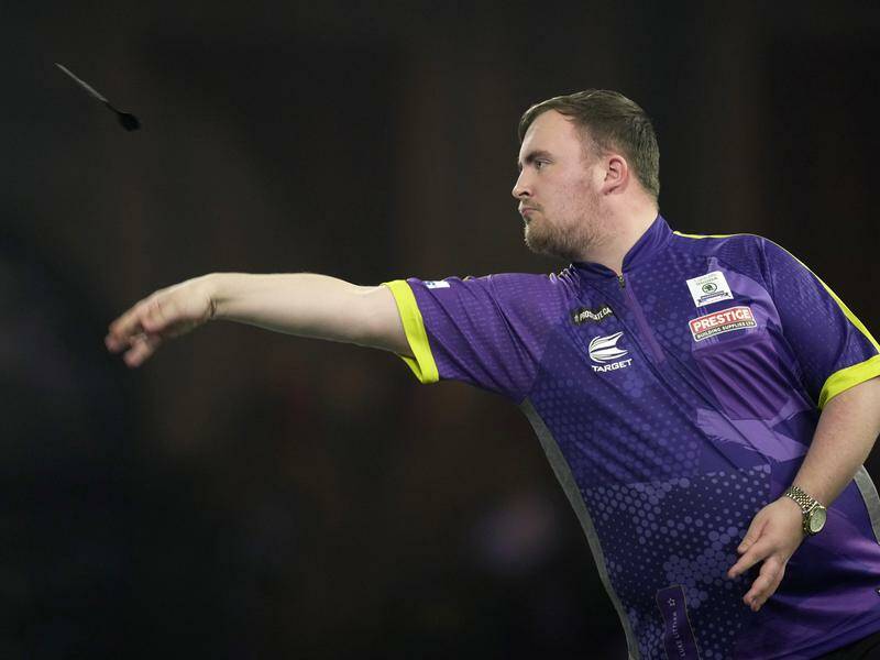 Luke Littler was forced to fight hard for his fourth round berth at the world darts championship. Photo: AP PHOTO