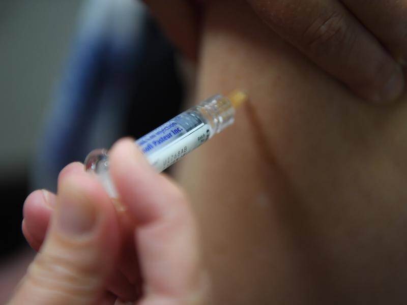 Australia's peak medical group is warning against false cures for COVID-19, including the flu shot.