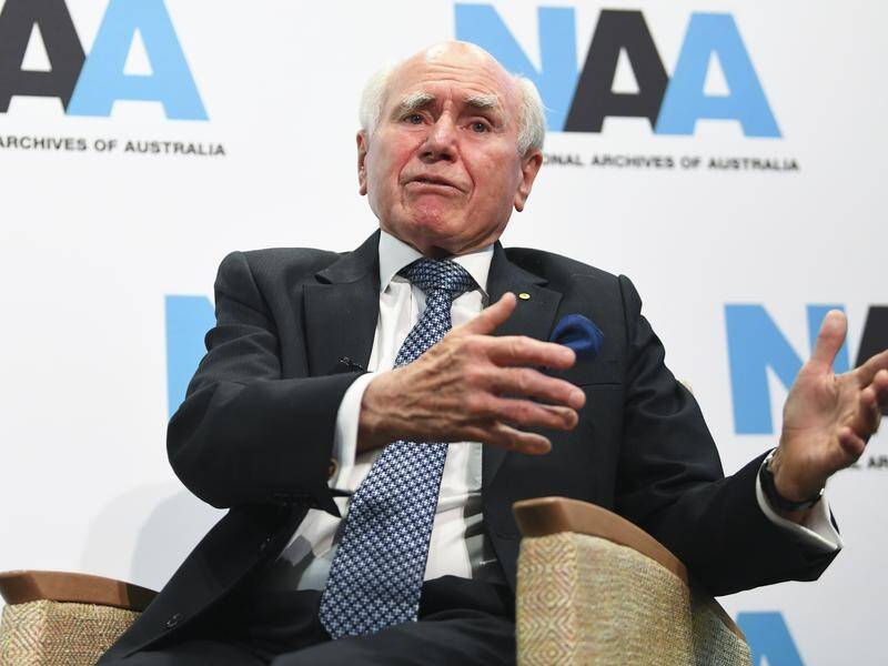 Former prime minister John Howard admits his government got off to a bad start with China.