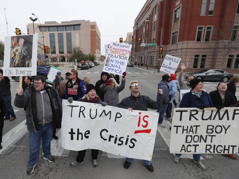 Protesters have taken to the streets in the US over President Donald Trump's emergency declaration.