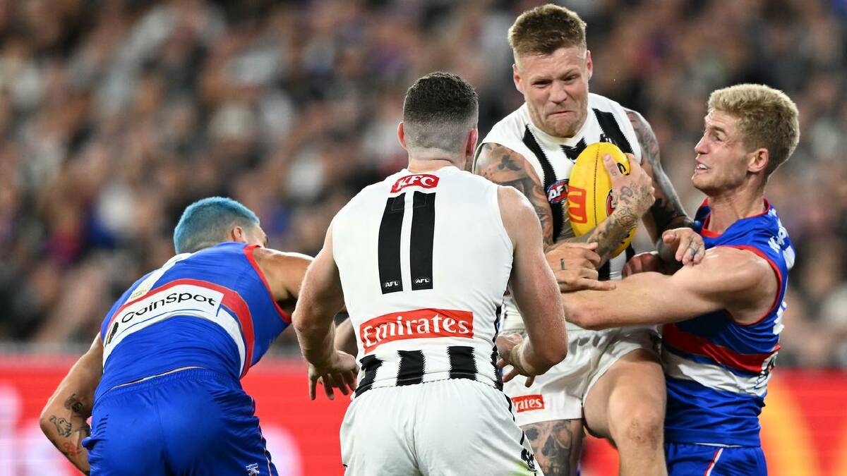 Jordan De Goey (second right) is set to return for the Magpies' clash with the Lions in Brisbane. (James Ross/AAP PHOTOS) Jordan De Goey (second right) is set to return for the Magpies' clash with the Lions in Brisbane. (James Ross/AAP PHOTOS)