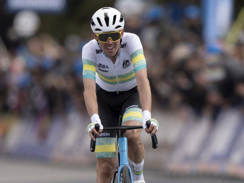 Australia's Ben O'Connor crosses the finish line in second place at the world championships. Photo: EPA PHOTO
