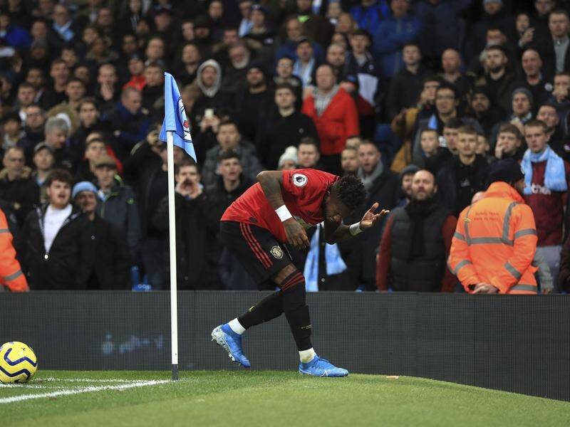 Manchester United's Fred reacts after objects are thrown at him during the derby at Etihad Stadium.