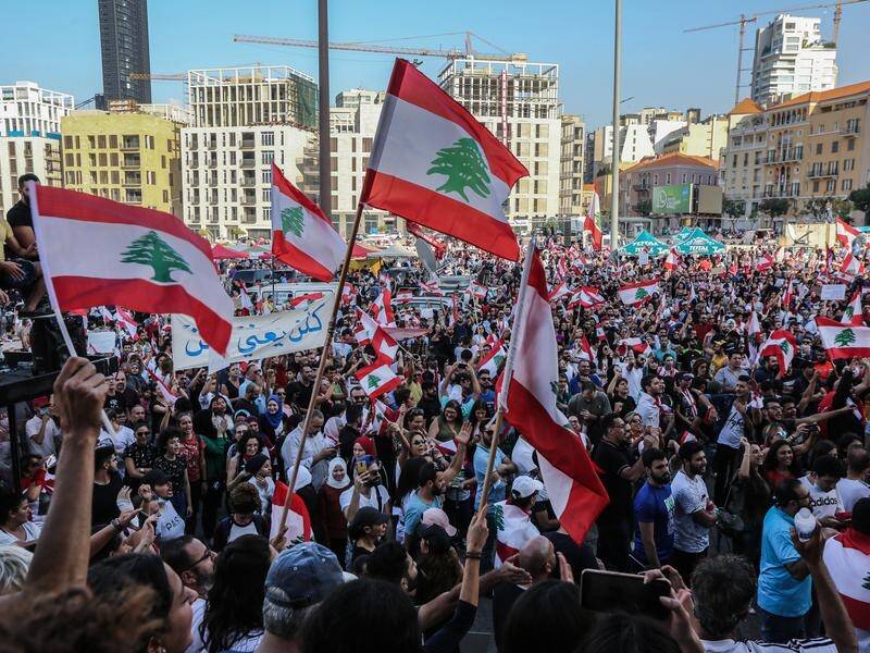 Protesters attend a demonstration against the government in downtown Beirut, Lebanon.
