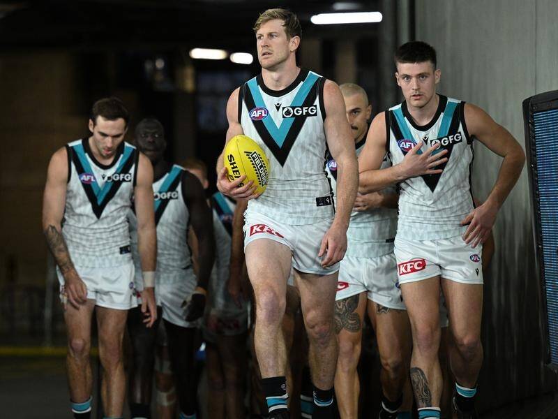 Tom Jonas (c) returns to lead Port Adelaide in their crunch match against Geelong. (James Ross/AAP PHOTOS)