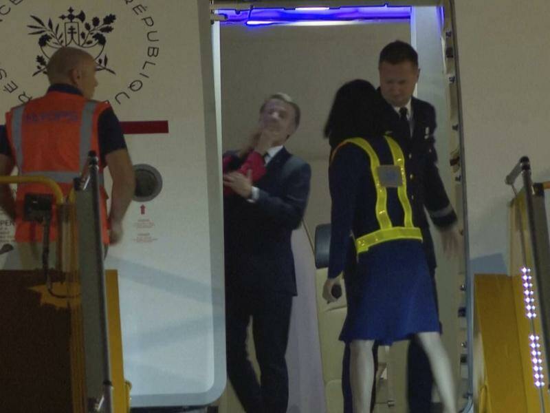 Video captured the moment France's President Emmanuel Macron was pushed away by his wife. Photo: AP PHOTO Video captured the moment France's President Emmanuel Macron was pushed away by his wife. Photo: AP PHOTO