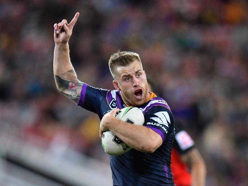 Cameron Munster won't be putting his hand up for the Storm when they play the Titans.