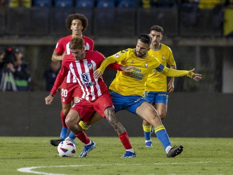 Las Palmas' Kirian Rodriguez (r) scored one of the goals in the upset 2-1 win over Atletico Madrid. (EPA PHOTO)