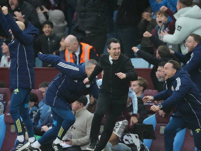 Coach Unai Emery leads the celebrations after Aston Villa's late winner against Arsenal. Photo: AP PHOTO Coach Unai Emery leads the celebrations after Aston Villa's late winner against Arsenal. Photo: AP PHOTO