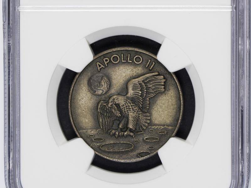 An Apollo 11 Robbins Medallion, owned by Neil Armstrong, will be offered for sale in an auction.