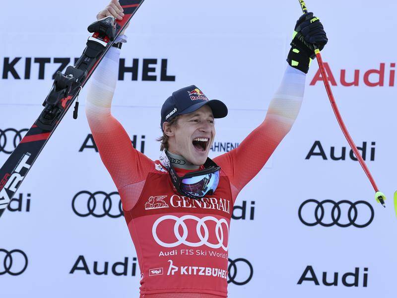 Switzerland's World Cup champ Marco Odermatt celebrates his first triumph at Kitzbuhel in a super-G. Photo: AP PHOTO Switzerland's World Cup champ Marco Odermatt celebrates his first triumph at Kitzbuhel in a super-G. Photo: AP PHOTO
