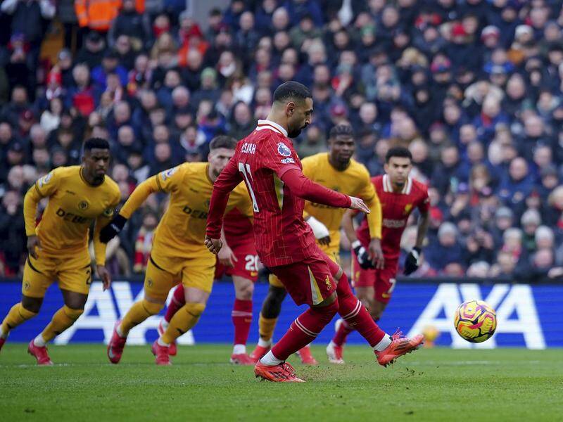Wolves players watching Liverpool's Mohamed Salah scoring from the penalty spot at Anfield. Photo: AP PHOTO Wolves players watching Liverpool's Mohamed Salah scoring from the penalty spot at Anfield. Photo: AP PHOTO