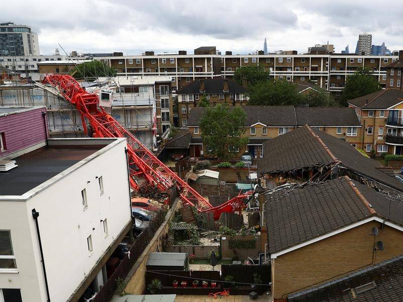 The collapse of a crane in London has left one person dead and four injured.