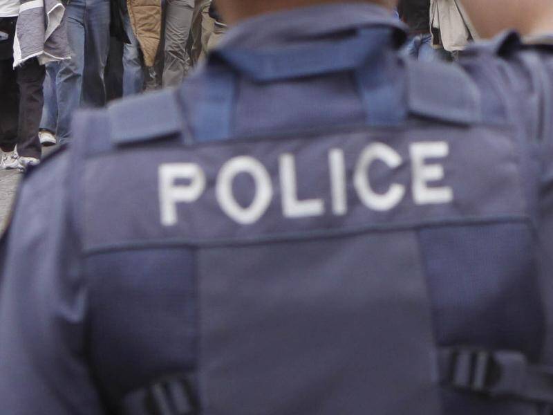South African police are hunting three alleged gunmen after six people were killed at a township. (AP PHOTO)