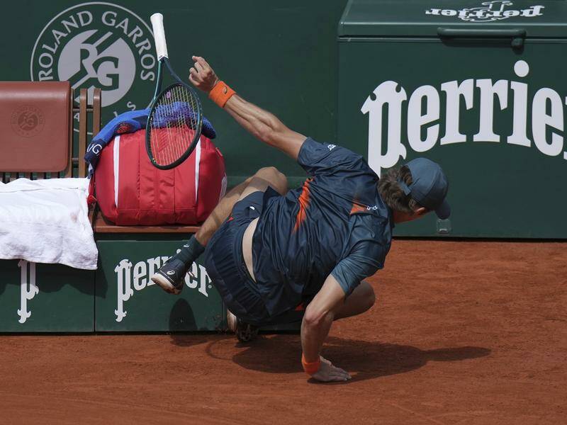 Alex de Minaur has been sent crashing out of the French Open by Alexander Bublik. Photo: AP PHOTO Alex de Minaur has been sent crashing out of the French Open by Alexander Bublik. Photo: AP PHOTO
