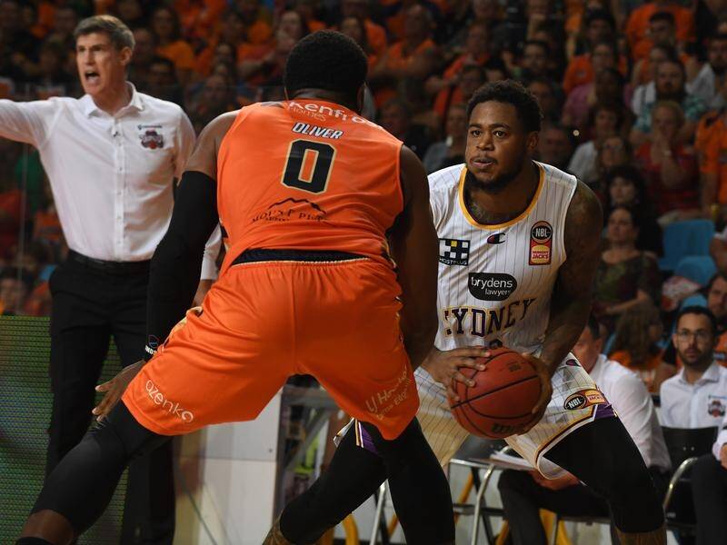 Jarell Martin (r) had a double-double in the Kings' 99-91 victory in Cairns over the Taipans.