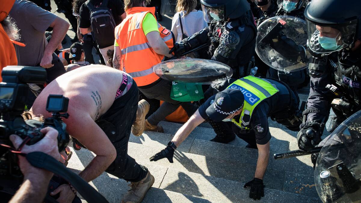 Protesters clash with Victoria Police at the Shrine of Remembrance in Melbourne last Wednesday. The protests continued over the weekend. Picture: Getty Images