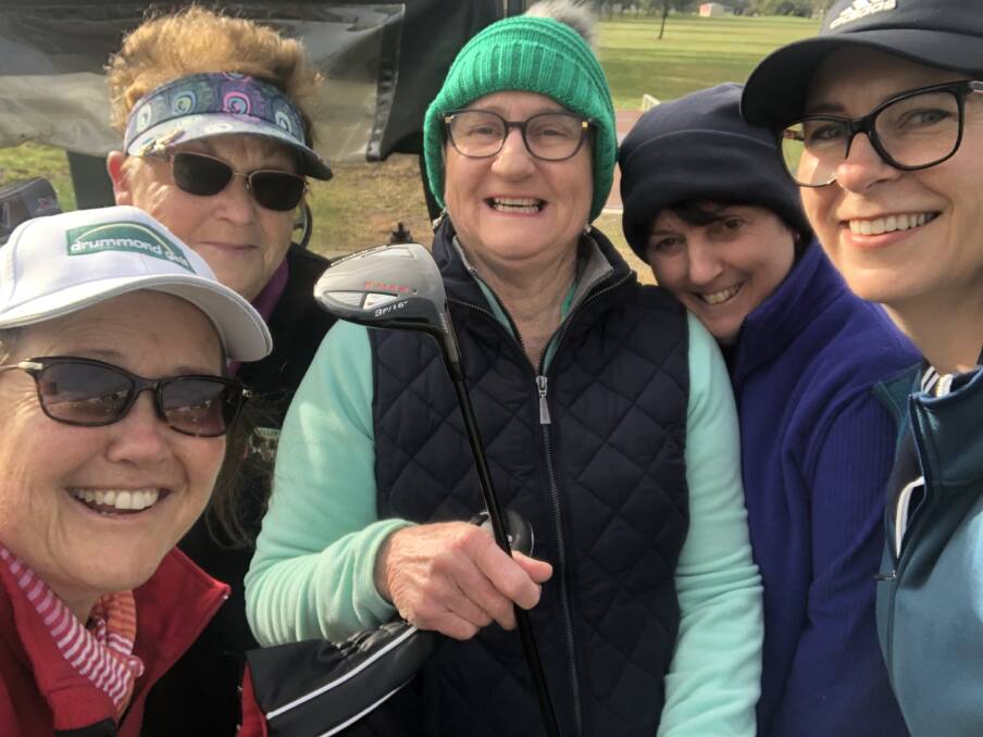 CHILLY: Henty lady golfers braved the cold and hit the course.