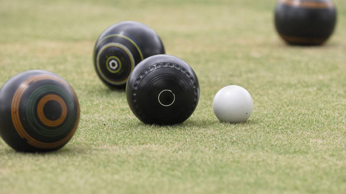 Business bowlers do battle on green