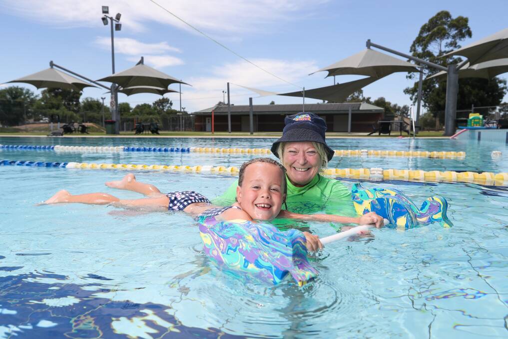 LIFE LESSONS: Swimming instructor Robyn Quigley has taught many children, including granddaughter Mariah Todd, 4. Picture: MARK JESSER