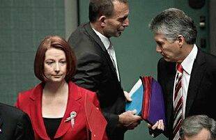 Abbott v Gillard: carbon price gets personal