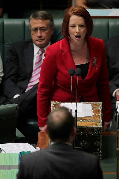 Fierce ... the Prime Minister, Julia Gillard, criticised Tony Abbott for attending a rally with "grossly sexist signs".